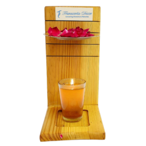 Handcrafted rustic pallet wood fragrance dispenser with a lit glass candle, metal aroma plate, and fresh red rose petals by Transcento Decor