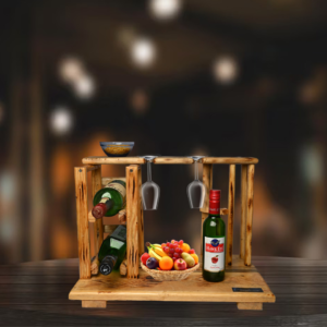 A handcrafted rustic wooden bar rack holding two liquor bottles and two hanging wine glasses, featuring a charred wood finish and a napkin slot.