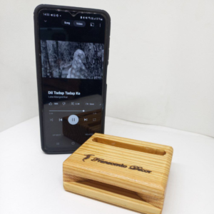 A three-tiered handcrafted wooden display stand made of light pine wood, perfect for organizing small plants, spices, or office accessories.