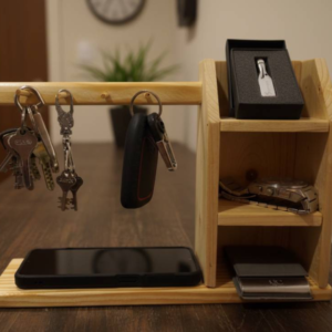 Rustic pine wood desk organizer featuring a circular analog clock, a vertical smartphone dock, and a square pencil holder.